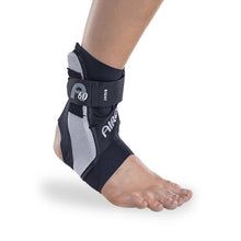 Load image into Gallery viewer, Aircast A60 Ankle Brace shown in colour black.
